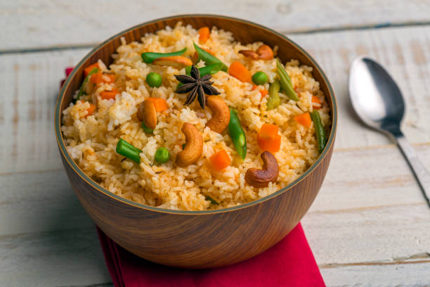 vegetable fried rice vegetable fried rice in a bowl fried rice stock pictures, royalty-free photos & images