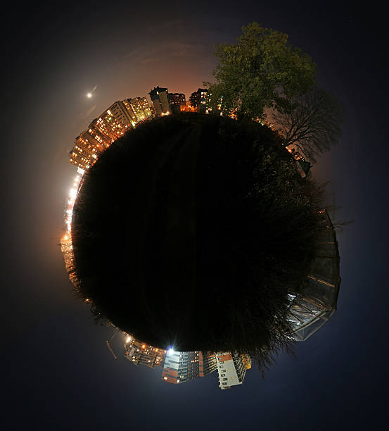 Silhouette of the world, lit up with city lights Small world fish eye lens photos stock pictures, royalty-free photos & images