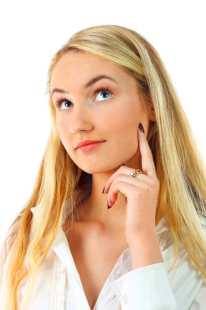 istock Beautiful young woman thinking 103970881