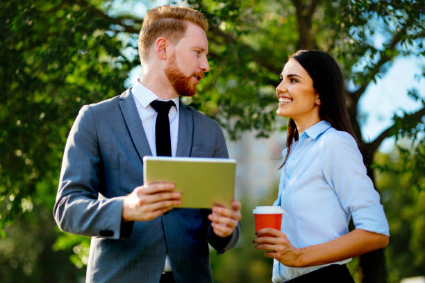 istock Business people talking in the nature 1039709732