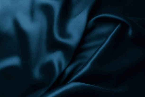 istock Blue satin silk, elegant fabric for backgrounds 1039710532