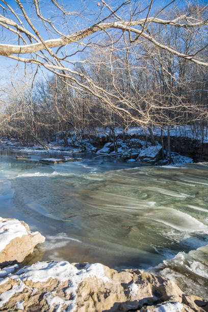 istock Frozen Waterfalls (Anderson Falls, Indiana) and River in Winter on a Bright Sunny Day 1039714278