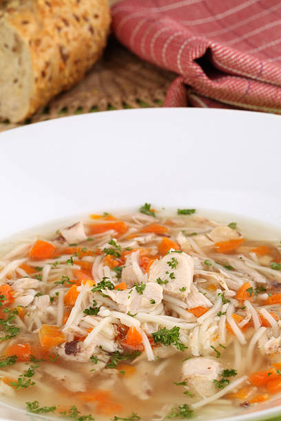 istock Chicken soup with pieces of meat 103971429