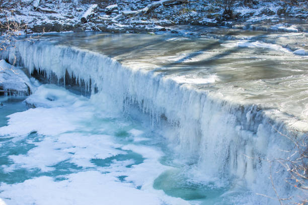 istock Frozen Waterfalls (Anderson Falls, Indiana) and River in Winter on a Bright Sunny Day 1039714510