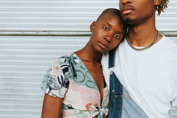 istock African american couple posing by a wall 1039721298