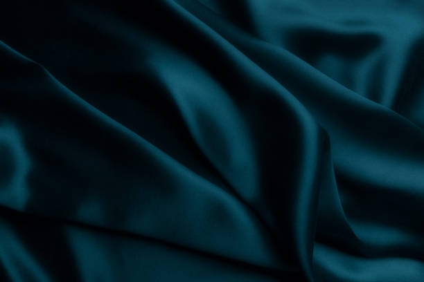 istock Blue satin silk, elegant fabric for backgrounds 1039727102