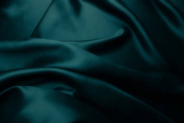 istock Green blue satin silk, elegant fabric for backgrounds 1039733852
