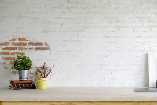 istock Mockup poster empty frame, office supplies and copy space on workspace table 1039763798