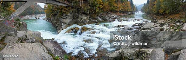 Mountain River Waterfall Stock Photo - Download Image Now - Autumn, Beauty In Nature, Bridge - Built Structure