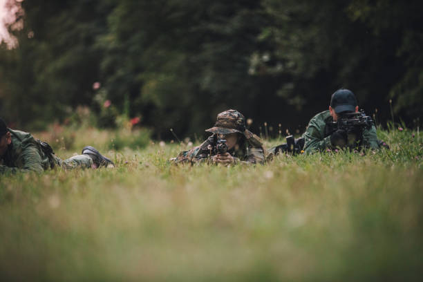 istock Military team hiding in grass 1039777692