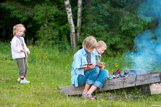 istock family near campfire 103978363