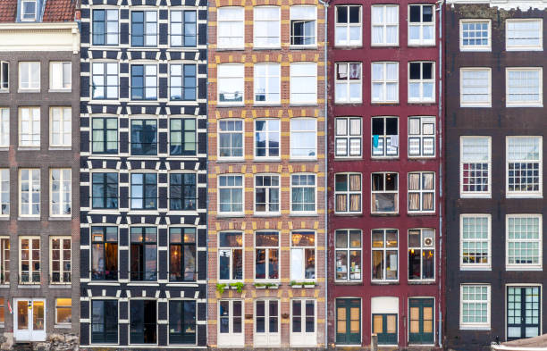 Urban background with residential building windows in Amsterdam, Netherlands