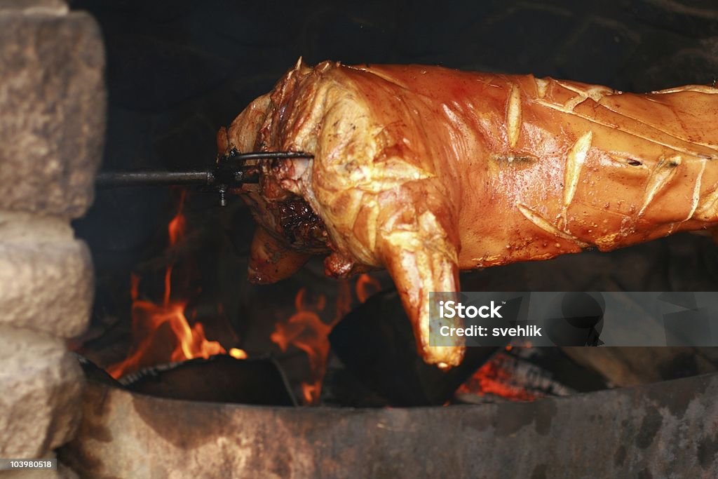 Porc rôti à la broche - Photo de Aliment rôti libre de droits
