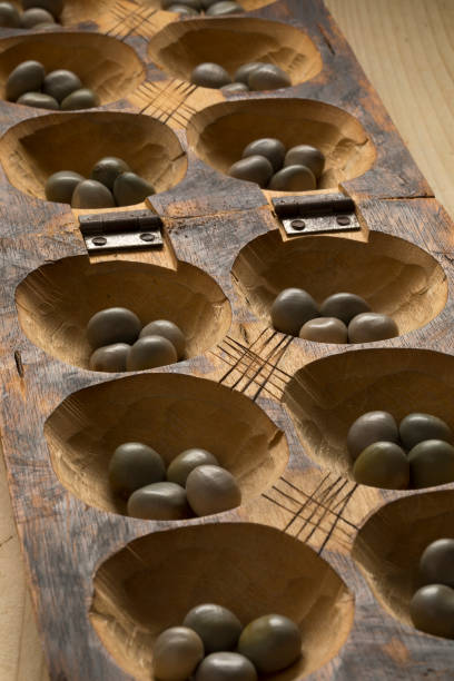 istock Traditional African oware game with seeds 1039813424