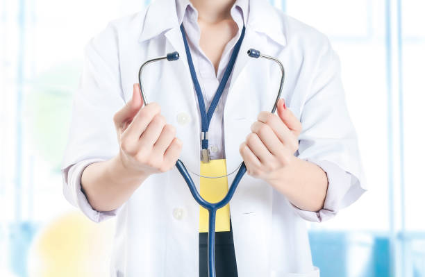 istock Female Doctor Hand Holding a Stethoscope 1039813770