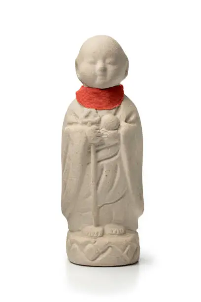 Japanese white monk statue isolated on white background