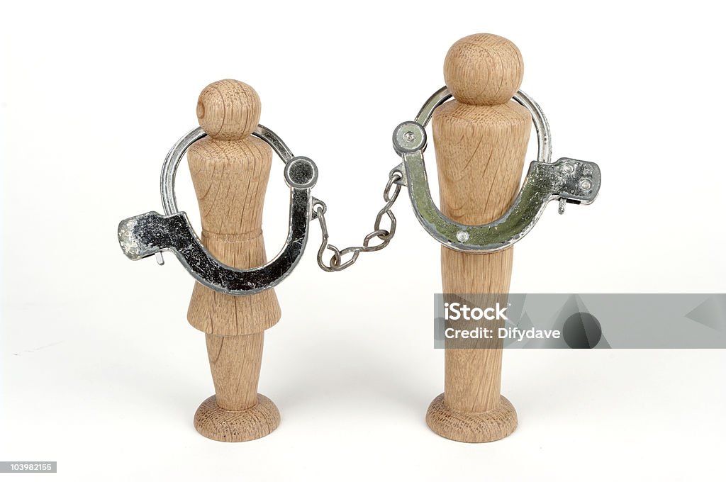 Mann und Frau mit Handschellen zahlen - Lizenzfrei Druck - Physikbegriff Stock-Foto