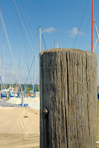 istock bollard and sailing boats 103982630