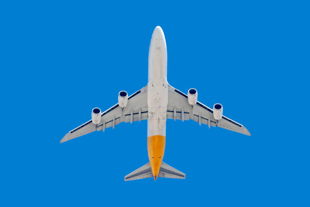istock Airplane taking off in the blue sky 1039831952