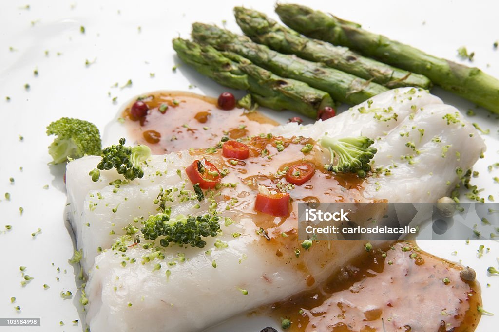 cooked hake dinner  Asparagus Stock Photo