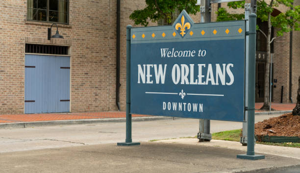 istock Sidewalk Sign Says Welcome to Downtown New Orleans 1039860662