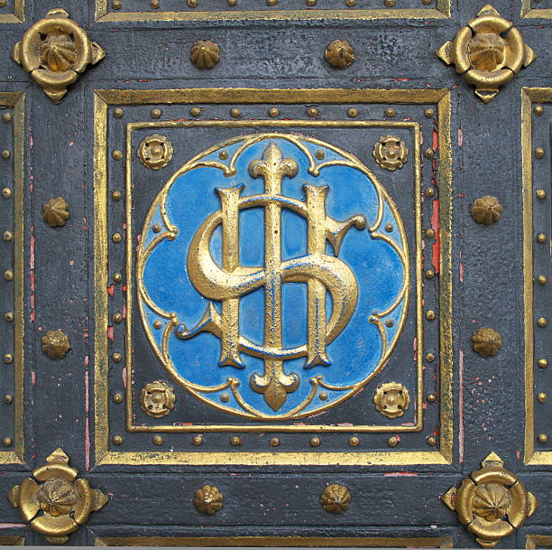 istock Emblem on doors of church 103986844