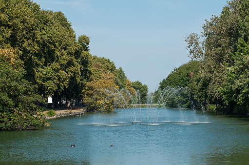 panorama of new pond with waterfall in Mulhouse