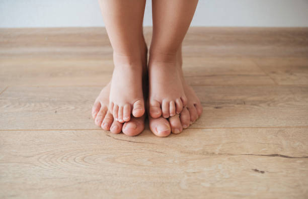 istock Mother and baby feet 1039886758