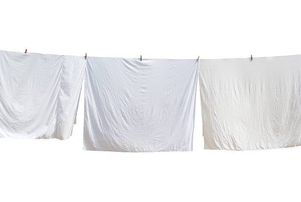 White sheet. White laundry. Element of design. hanging fabric stock pictures, royalty-free photos & images
