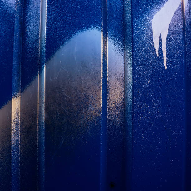 istock painted metallic blue color is sprayed with silver paint. 1039890760