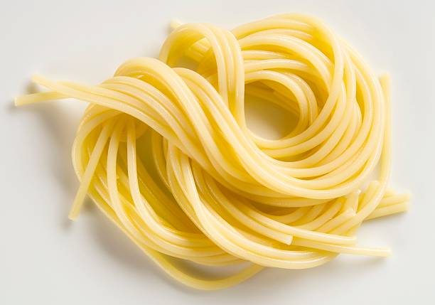 istock Pile of boiled spaghetti on a white background 103990737