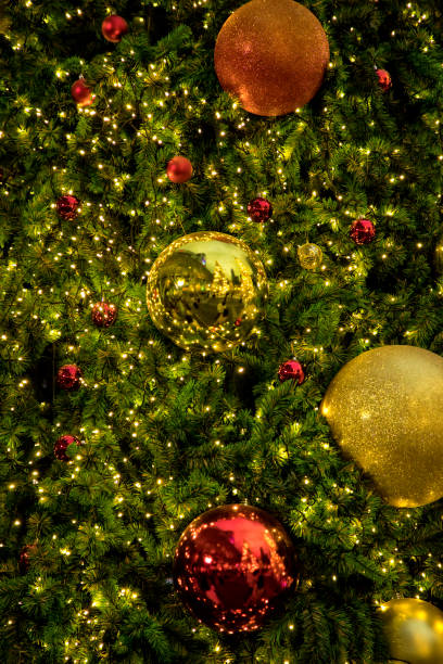 istock Close up decorated Christmas tree with lights and ornaments 1039919764