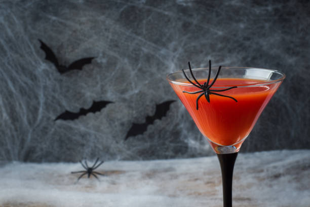 istock Bloody Mary cocktail, spider web background and bats for Halloween, selective focus 1039924842