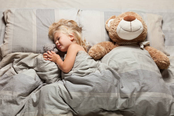 istock Kid girl nightmare problem. Scared, stress, terror in bed 1039929788