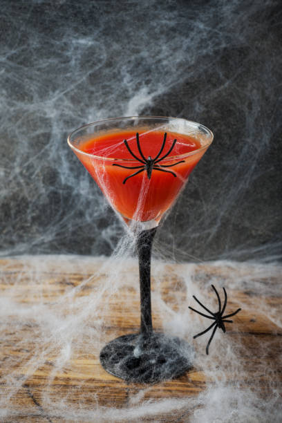 istock Bloody Mary cocktail, spider web background for Halloween, selective focus 1039936514