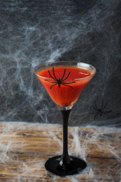 istock Bloody Mary cocktail, spider web background for Halloween, selective focus 1039936518