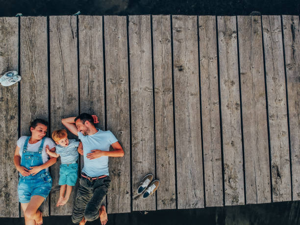 istock Loving family on a lake trip 1039937206