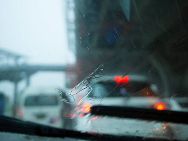 istock Windscreen wiper arm and blade removing rain 1039938034