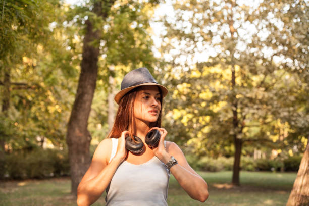 istock Woman relaxing in park. 1039939282