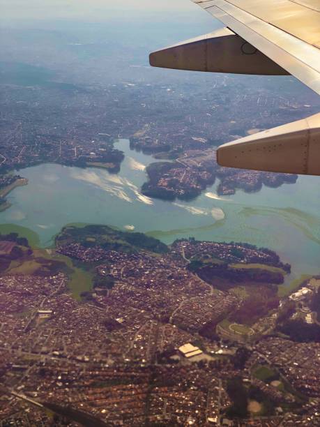 istock Top view of a river and airplane wing. 1039939346