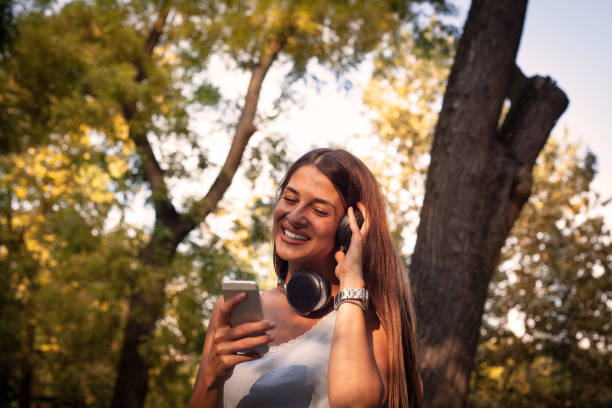 istock Listening to the hottest summer tracks . 1039942142