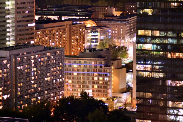istock Night lights, city office building downtown, cityscape view 1039943332
