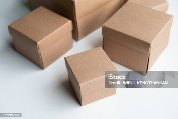 Grouping Of Cardboard Boxes On White Background Light Brown Cardboard Boxes Carton Box Online Shopping And Ecommerce Concept Stock Photo - Download Image Now
