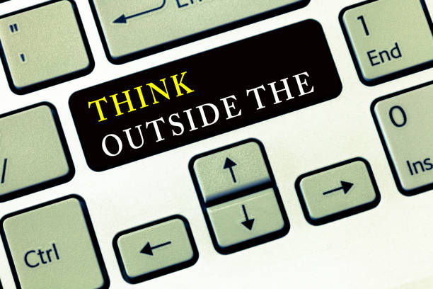 istock Writing note showing Think Outside The. Business photo showcasing Creative Thinking Looking in different perspective 1039956794