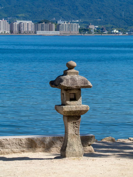 istock Stone lantern at Itsukushima island, Japan 1039957402