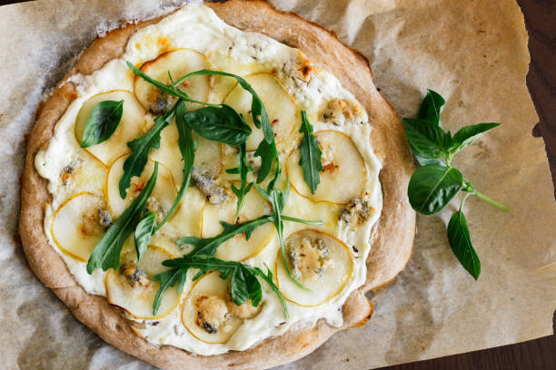 istock Pizza with cream sauce, pears and cheese dor blue. 1039958460