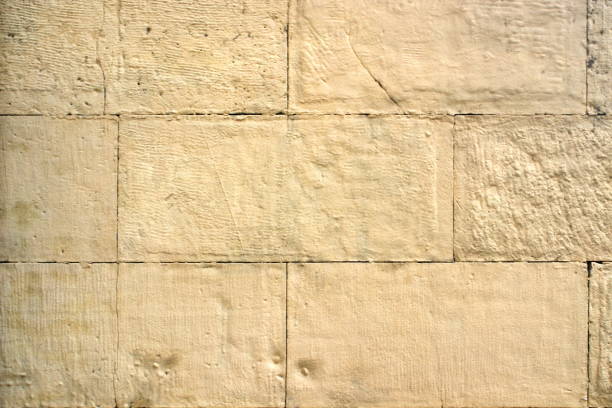 istock The image of old yellow brick wall closeup. 1039962926