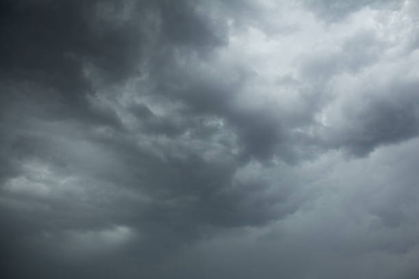 istock Dark storm clouds in the sky before a rain 1039971124