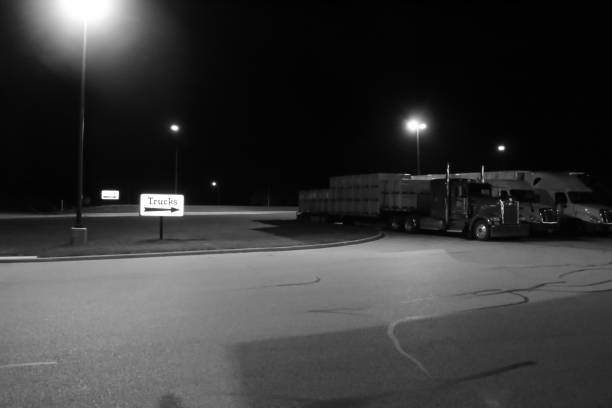 truck stop at night black and white
