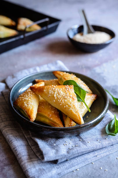 istock Spanakopita triangles stuffed with spinach and Feta cheese 1040000012